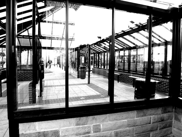 Shelter and seats where buses arrive and depart in Todmorden, West Yorkshire