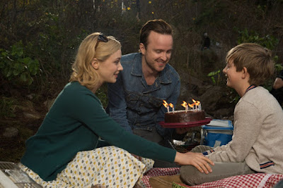 Sarah Gadon, Aaron Paul and Aiden Longworth in The 9th Life of Louis Drax
