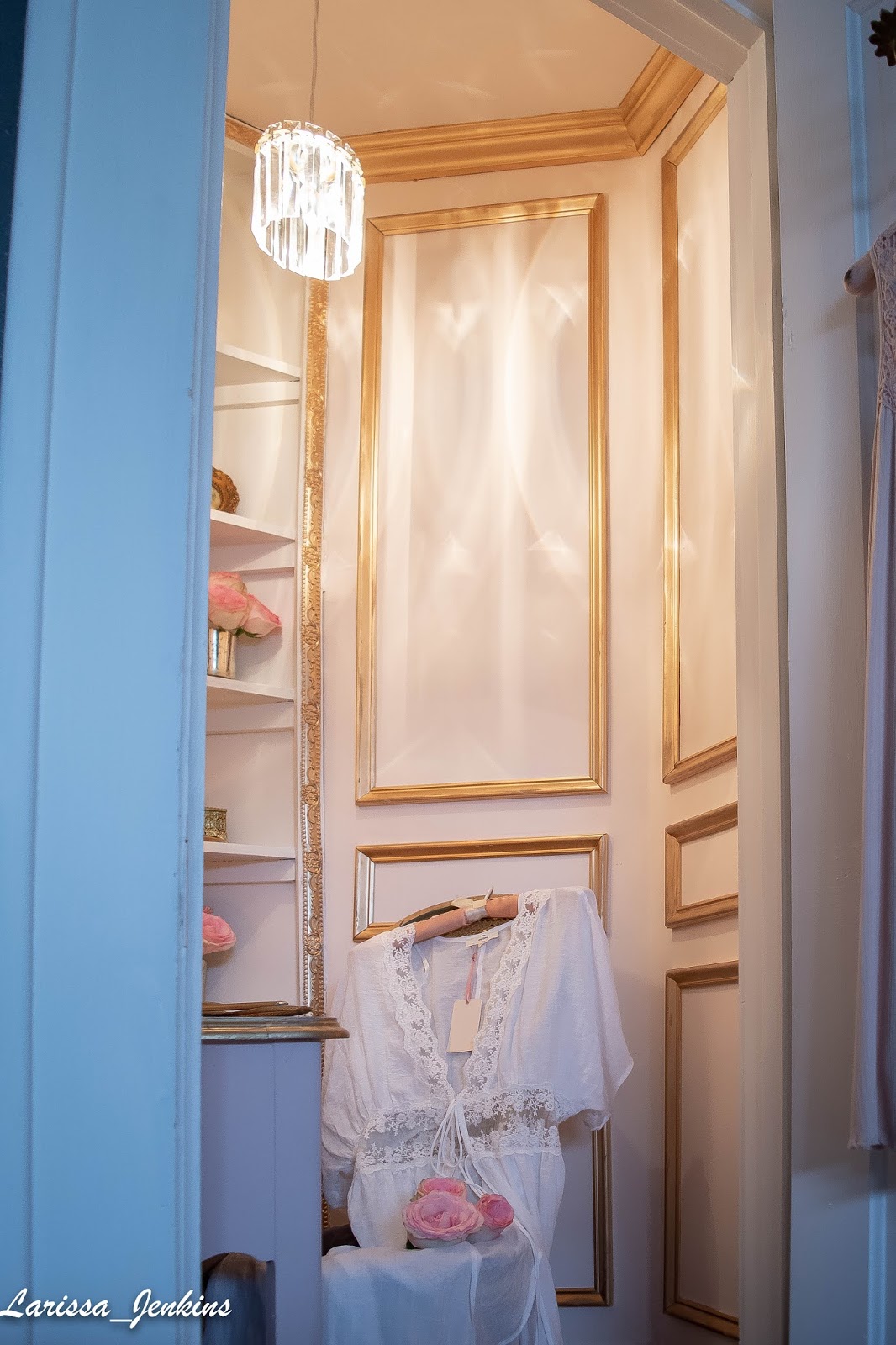 I bought a 6 ceiling medallion off of amazon and painted it gold.