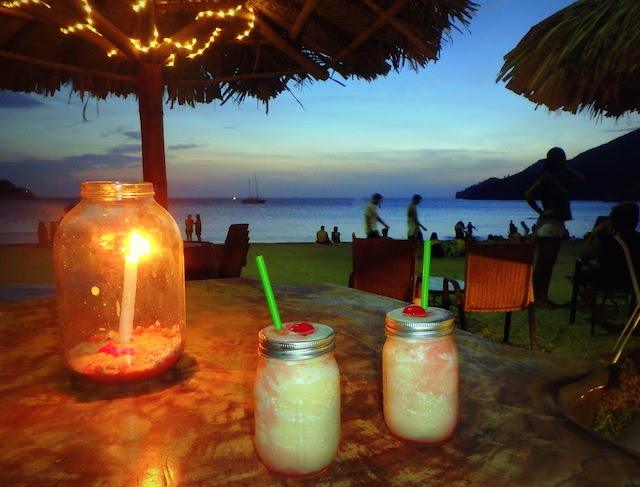 Pina coloada at sunset at Taco Beach Bar in Taganga, Colombia