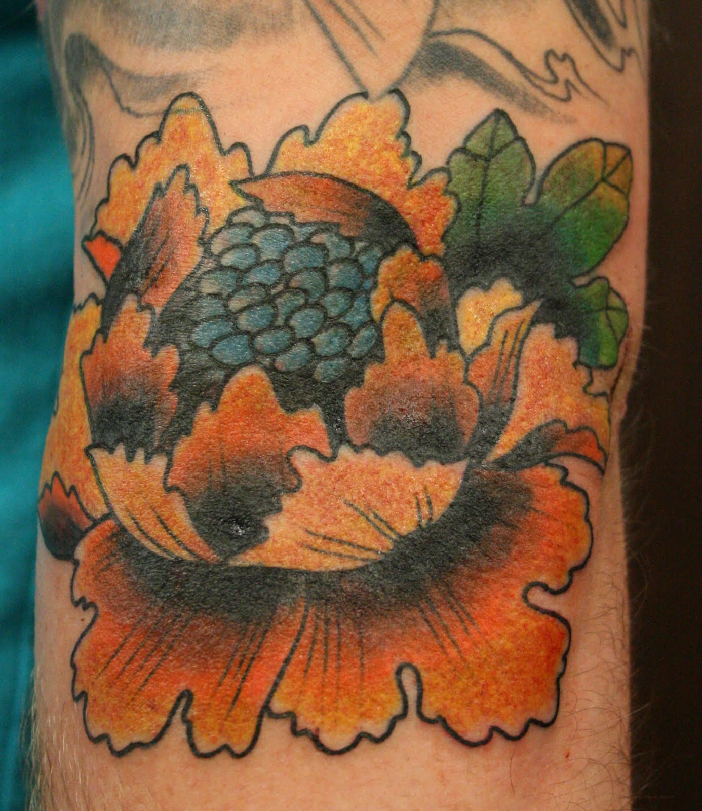 Iron Heart Tattoo couple tattoos by Sean Wilcox