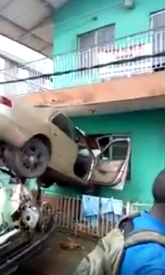 Photos/Video: Car rams into residential building in a freak accident at Yaba