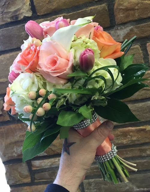 Peach, pink and white prom and wedding clutch bouquet by Stein Your Florist Co.