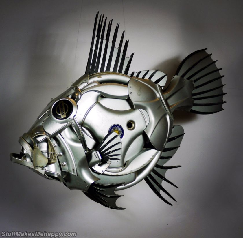  Stunning Sculptures Made out Hubcaps by Ptolemy Elrington