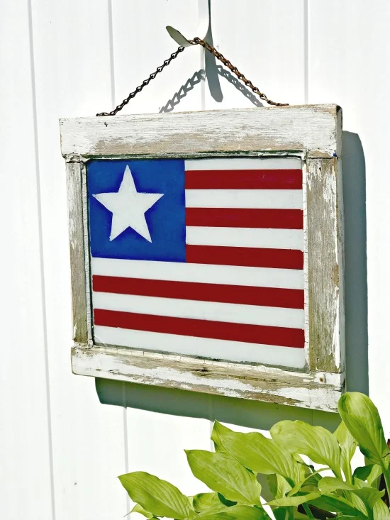 Painted American flag on chippy window