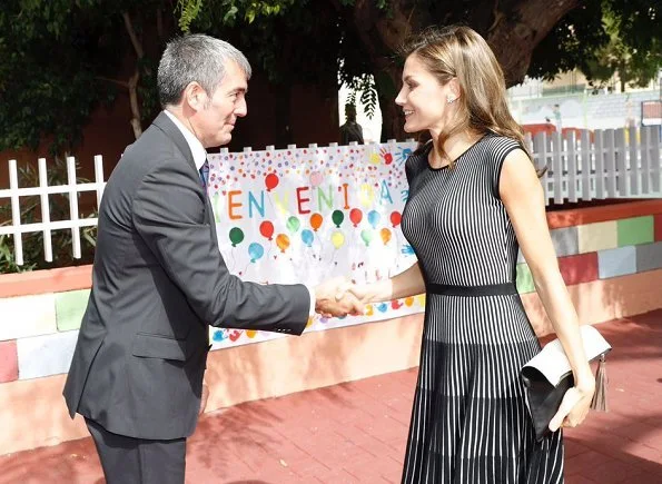 Queen Letizia wore Hugo Boss Orange Wynola Knit Dress,  Diamond star earrings and Uterque Shoes. Canary Islands