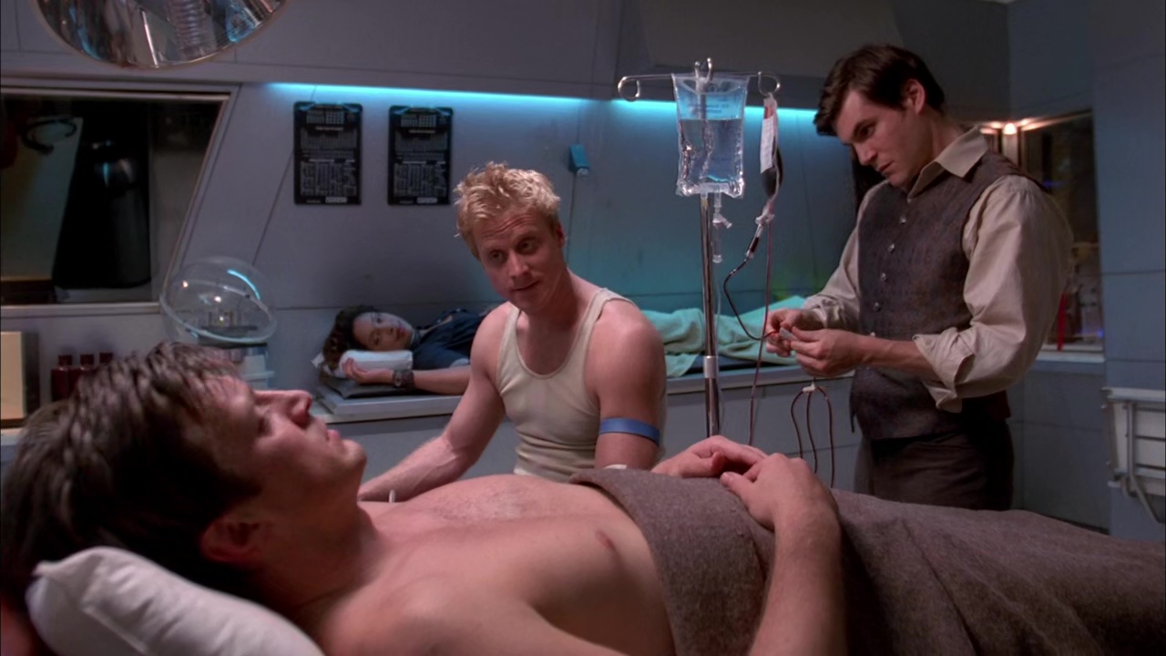 Nathan Fillion shirtless in Firefly 1-08 "Out Of Gas" .