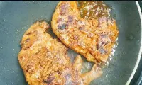 Roasted tandoori chicken on pan for Tandoori chicken recipe on stove top