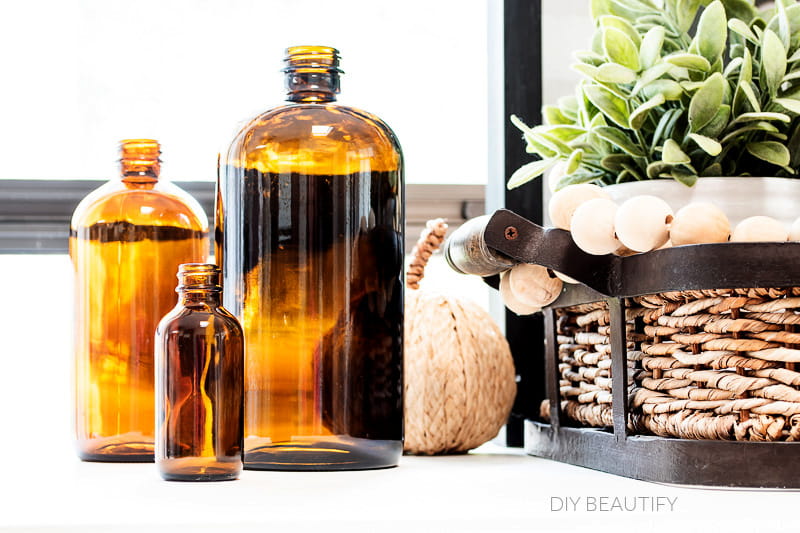 How to Decorate with Amber Glass Bottles (and where to find them cheap