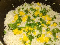 Saffron soaked milk over rice in pressure cooker for veg biryani recipe