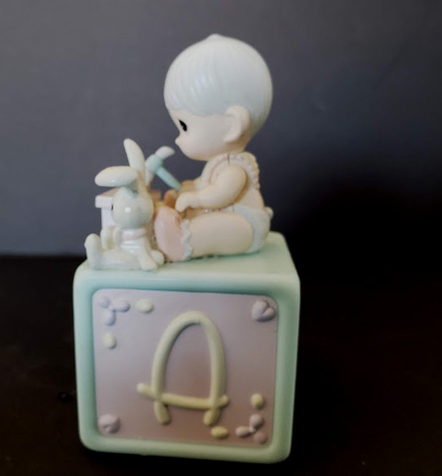 Enesco musical animated baby figurine