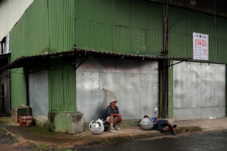 man in front of building in Puriscal