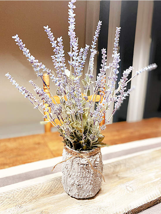 cement planter filled with lavender