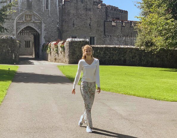 Crown Princess Elisabeth wore Zara pink and blue paisley floral print flared trousers at St Donat's Castle