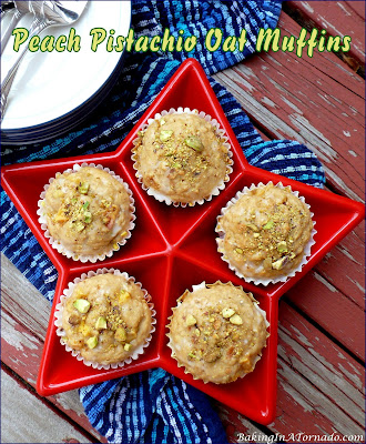 Peach Pistachio Oat Muffins, an easy breakfast favorite. Chopped peaches and pistachios add flavor and texture to an oat muffin. | Recipe developed by www.BakingInATornado.com | #recipe #bake