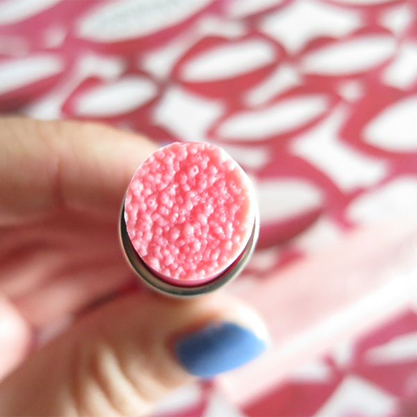 Detail shot of bumpy texture of new tube of Dior Addict Lip Sugar Scrub