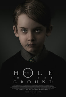 The Hole in the Ground 2019 Dual Audio ORG Hindi 720p BluRay 800MB ESubs IMDb: 5.7/10 || Size: 794MB || Language: Hindi+English (Original DD Audios)  Genre: Drama, Horror, Mystery Quality: 720p BluRay  Director: Lee Cronin Writers: Lee Cronin, Stephen Shields  Stars: Seána Kerslake, James Quinn Markey, Kati Outinen  Storyline: A single mother living in the Irish countryside with her son begins to suspect he may not be her son at all, and fears his increasingly disturbing behavior is linked to a mysterious sinkhole in the forest behind their house.