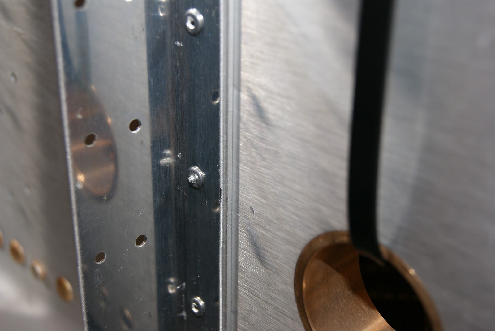 DOG Aviation John's RV-12 Blog: Riveting Rib Attach Clips Onto Left Spar