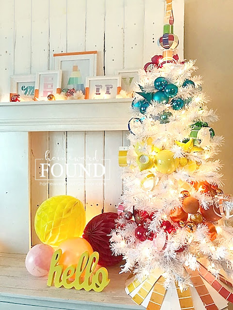 Christmas,Christmas Decor,Christmas Decor Themes,Christmas tree,color,color palettes,colorful home,decorating,diy decorating,DIY,holiday,seasonal,winter,ornaments,colorful Christmas,colorful Christmas decor, roygbiv,color gradient,rainbow aesthetic,decorating with color,merry and bright Christmas decor,garlands on Christmas trees,tree garlands,DIsneyland Christmas tree ornaments,Disney,rainbow swirl Christmas tree decor