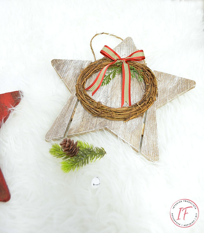 White hand painted Christmas wood stars with rustic charm that are quick and easy to make with dollar store finds.