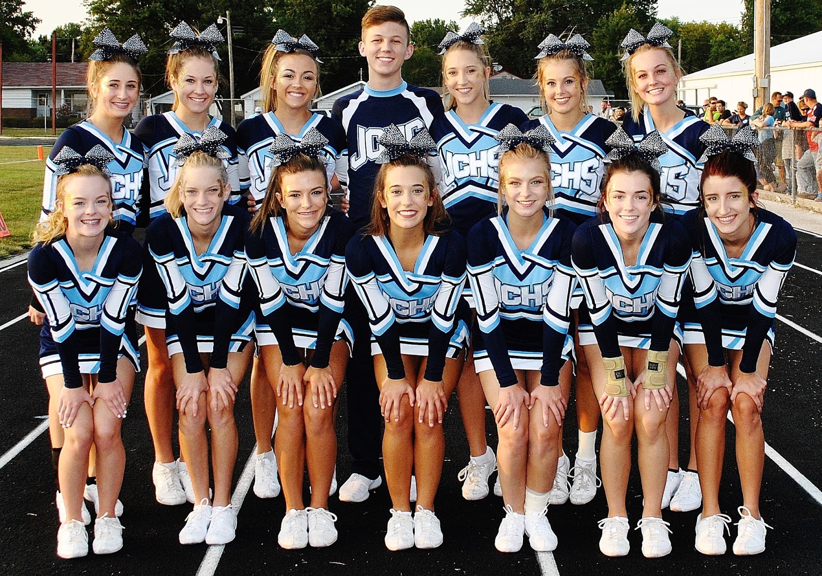 HOME OF THE JERSEY PANTHERS Cheerleaders/Blue Crew/Mascot