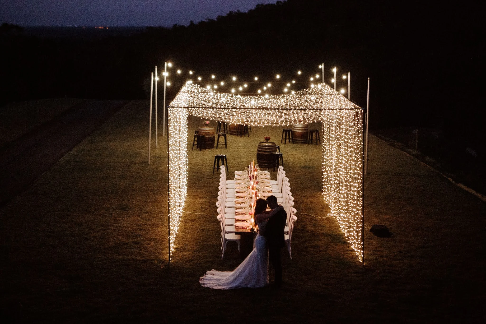 Kayla Temple Photography festoon lighting bridal gowns tablestyling