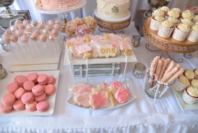 girly first birthday party dessert table