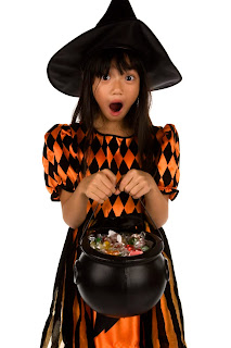 Little witch with cauldron