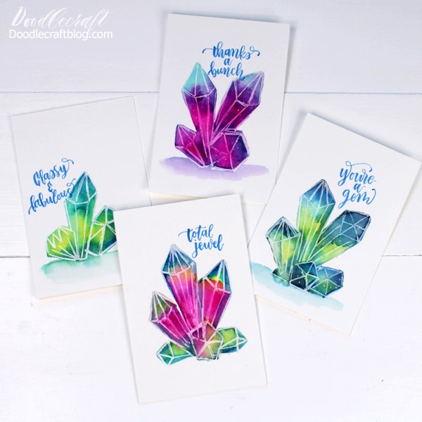 Painting a watercolor galaxy is such a fun technique, and painting them in little crystal clusters is absolutely dreamy! Geometric crystals are so fun to draw and much more simple than you might think! This fun craft is easy for all skill levels and great for beginners.