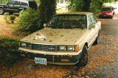 OLD PARKED CARS.: 1982 Nissan Maxima Diesel.