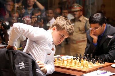 http://chesslive.com/blog/2013/11/12/campeonato-del-mundo-ronda-3-anand-carlsen/