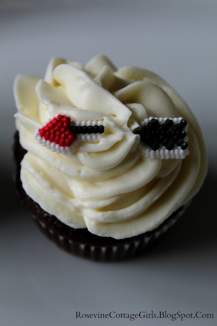 Valentines Day Chocolate cupcake with arrow in the cream cheese frosting.