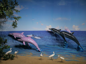 Diorama with dolphins and egrets at the Guangxi Planning Exhibition Hall