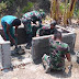 Gandeng Masyarakat Peduli Kebersihan Lingkungan, Satgas Yonif Raider 142/KJ Buat Bak Sampah