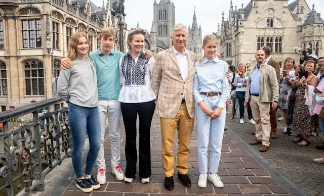 Queen Mathilde wore a castaly embroidered shirt by Dries van Noten. Crown Princess Elisabeth and Princess Eleonore