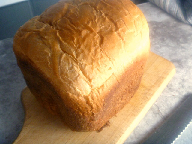 Light and fluffy homemade bread straight from your bread machine.  Hot from the oven and slathered with butter will have you swooning for more! - Slice of Southern