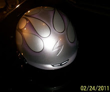 Purple custom painted flames on a helmet