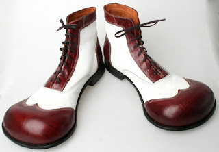 Time to hang up the shoes shoes... Clown shoes