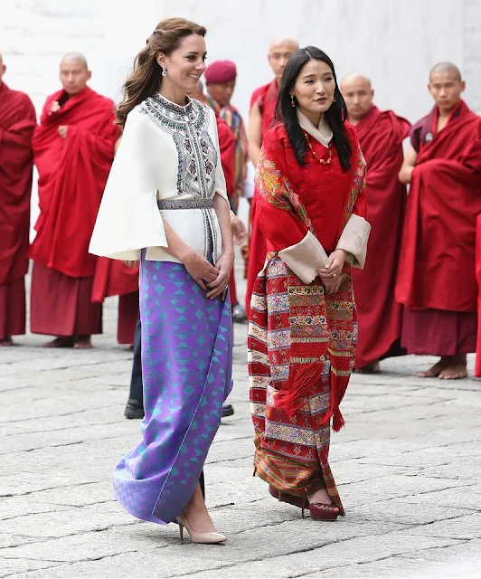 Britain's Prince William and Catherine, Duchess of Cambridge walk with King Jigme Khesar Namgyel Wangchuck and Queen Jetsun Pema