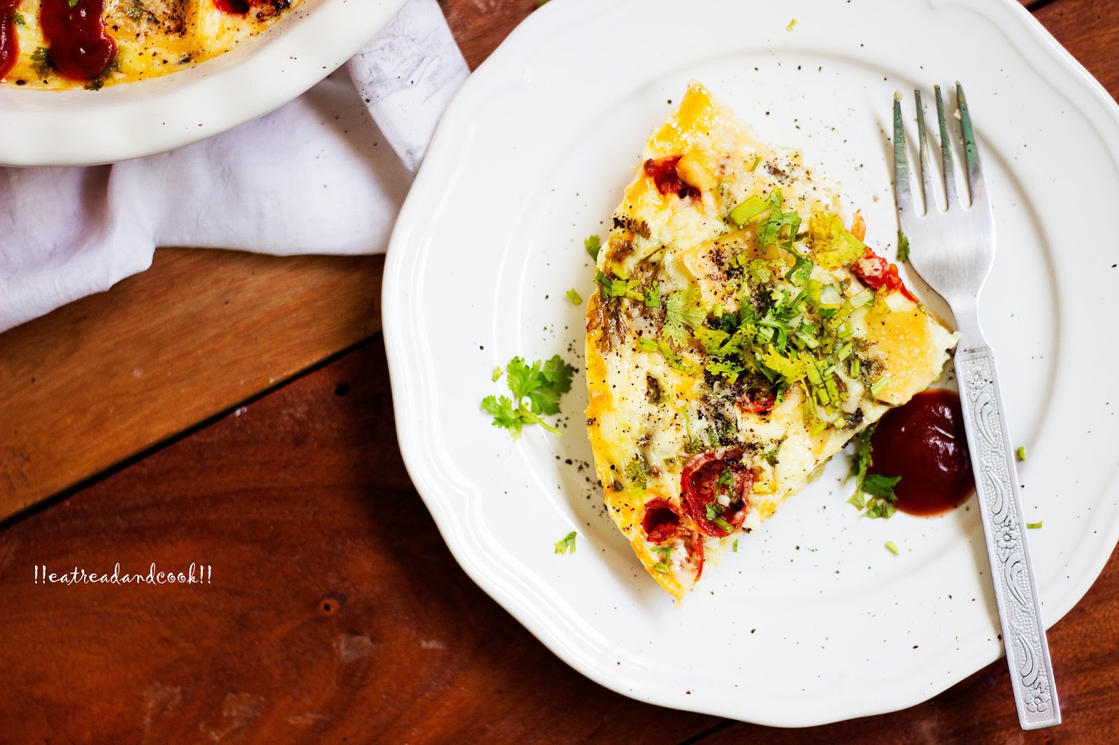 Crustless Quiche with Caramelized Onions and Cherry Tomatoes