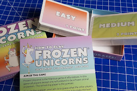 Frozen Unicorns Family Party Game box contents cards and instructions