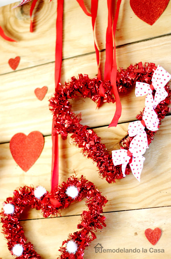 hearts with pom poms, bows, ribbon red
