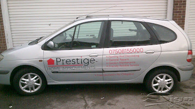Prestige Home Improvements vehicle livery featuring the logo, phone number (07508155000) and bullet points on the side of the car. Using red and black as the main colours.