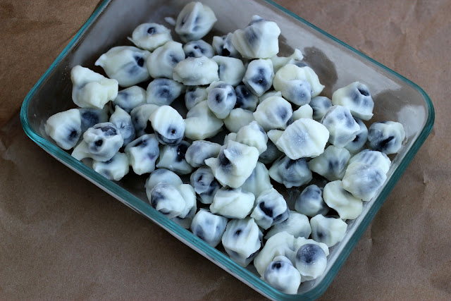 Make these easy and Delicious Greek yogurt-covered blueberries for the freezer in minutes! Enjoy them at your next summer party!