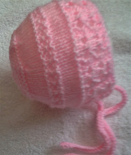 http://www.craftsy.com/pattern/knitting/accessory/baby-belle-bonnet/205755?rceId=1463478096497~t18ggntz