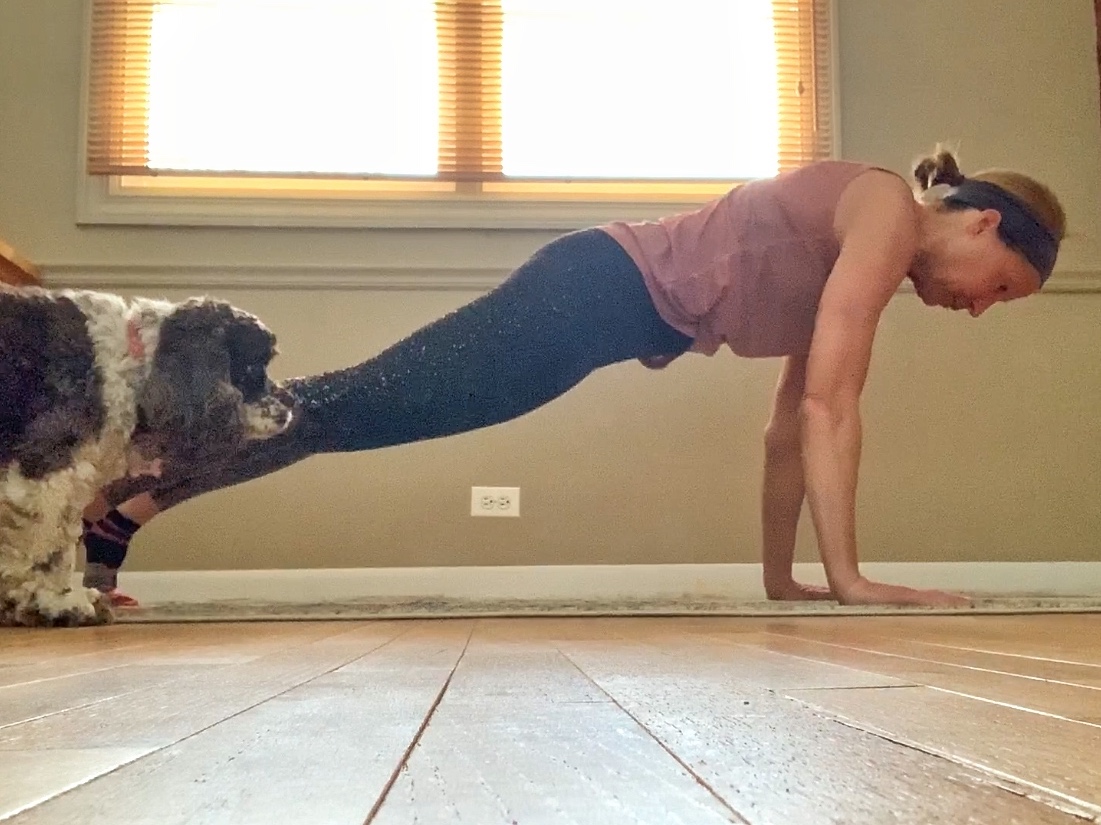 Slowly lower back to the floor with control. Allow your chest to touch