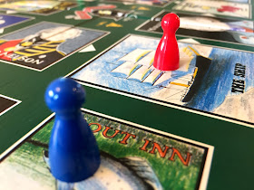 A two-player game of Inns & Taverns. The red player is far ahead of the blue player.