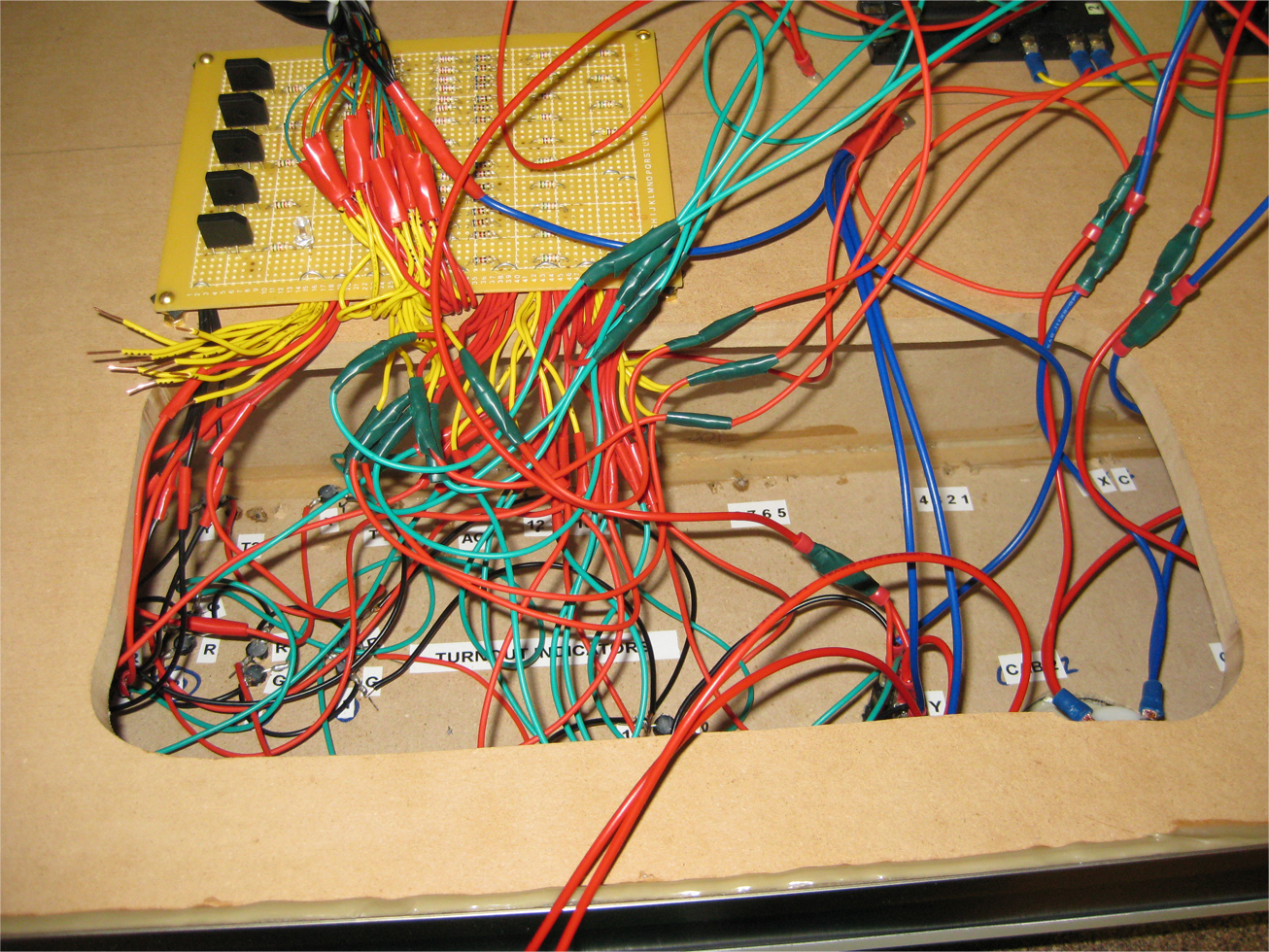 Wiring components together inside a model railroad control panel