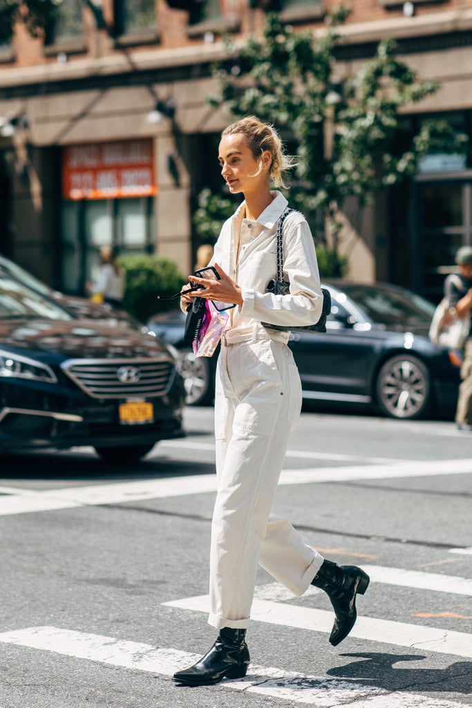 25 Cool Jumpsuits for Fall and Beyond — Street Style Outfit Inspiration — White Utility Jumpsuit and Black Ankle Boots