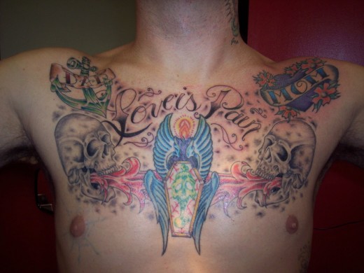 16 Outstanding Chest Plate Tattoo Designs For 201112